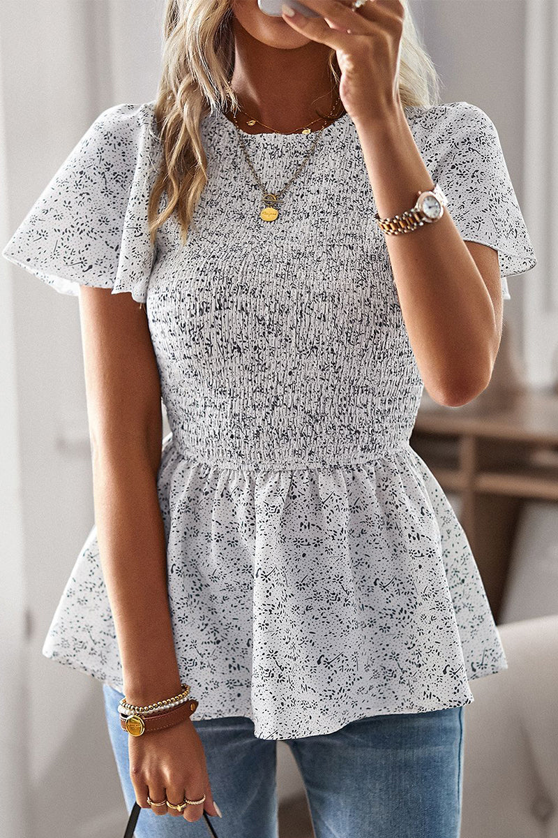 Louisa - Blouse fleurie stylée à manches courtes avec ourlet à volants