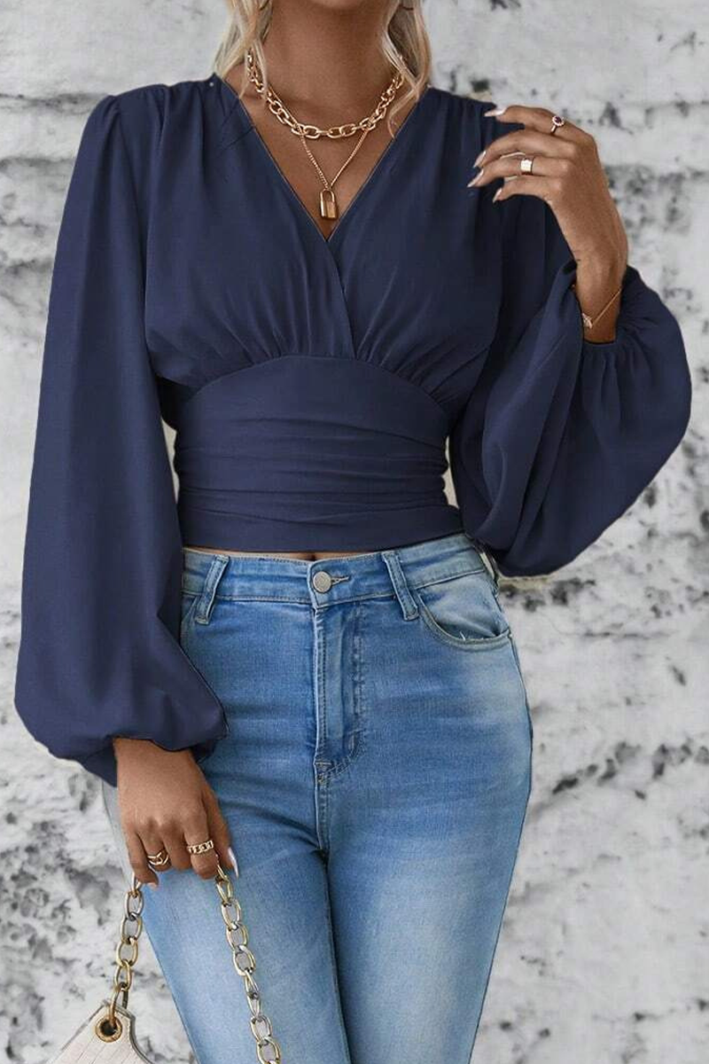 Emmie - Blouse stylée avec col en V et manches longues évasées