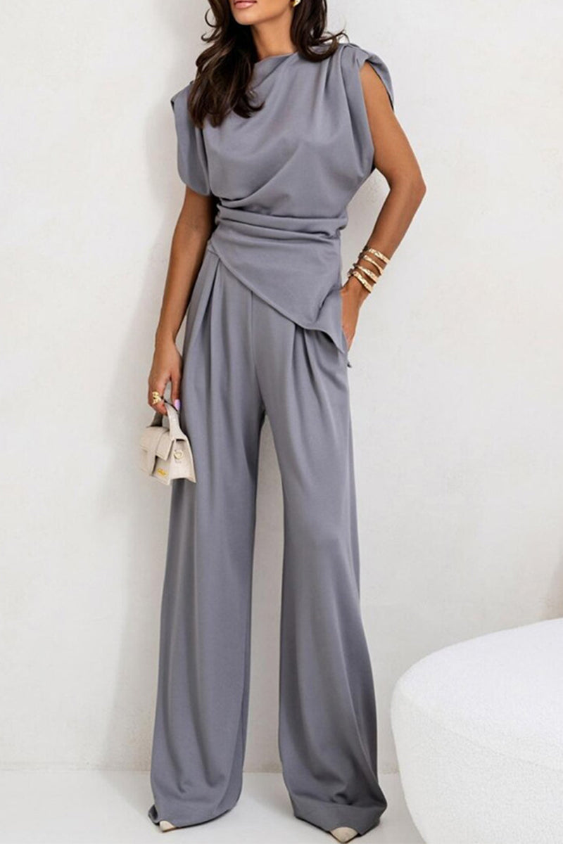 Madeleine - Ensemble élégant blouse sans manches et pantalon plissé