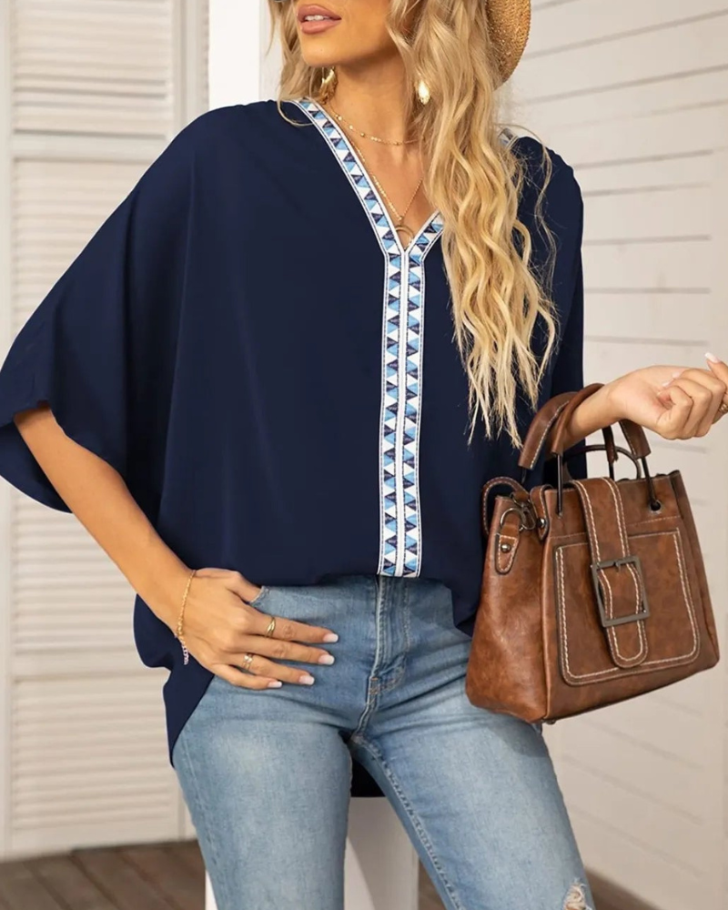 Lyla - Blouse ample à col en V et manches chauve-souris