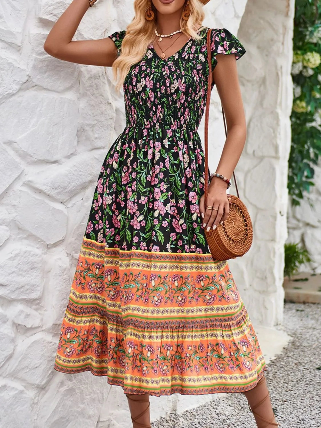 Cassandra - Robe fleurie élégante à manches courtes