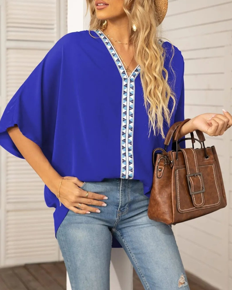 Lyla - Blouse ample à col en V et manches chauve-souris