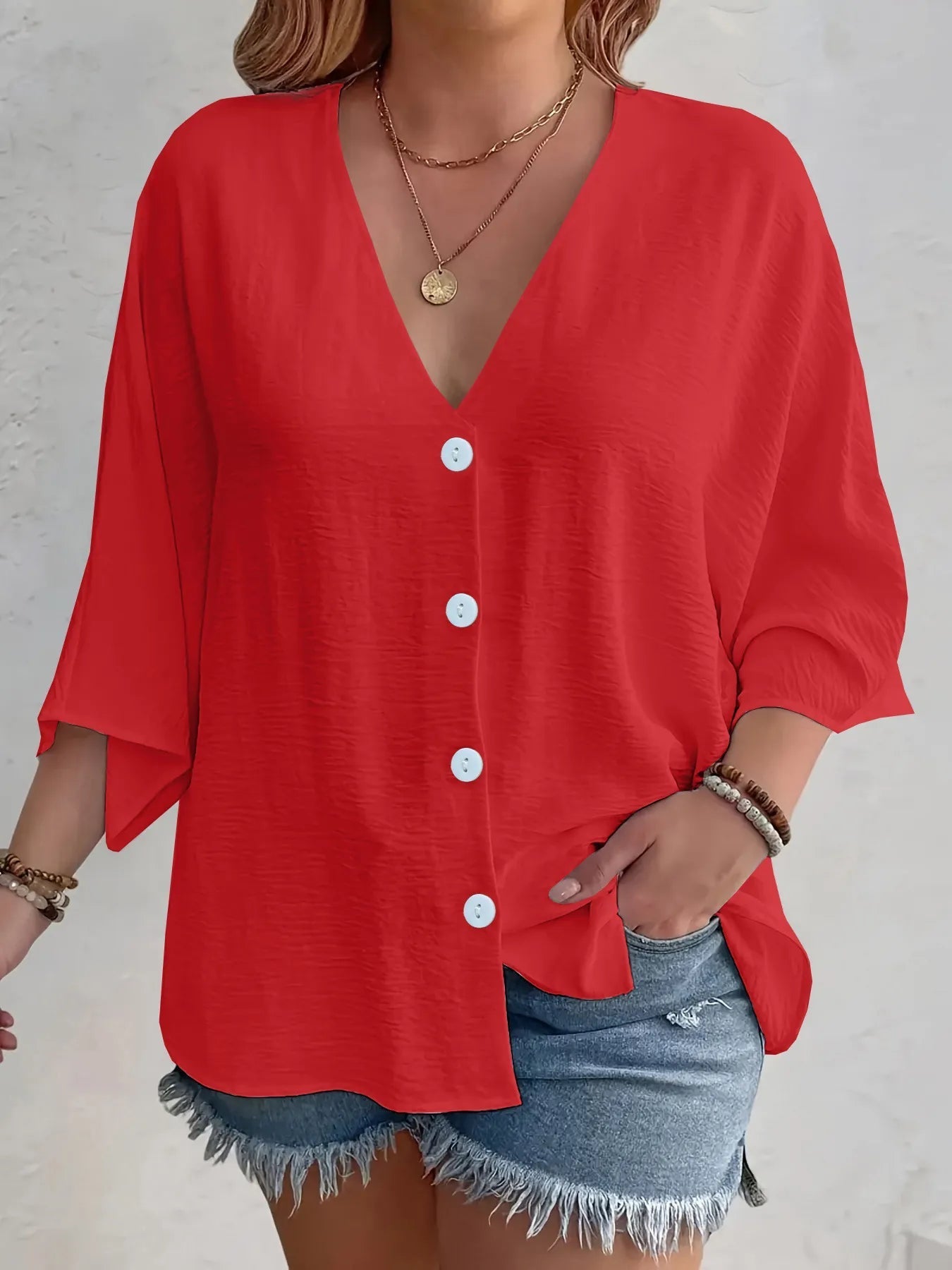 Amirah - Blouse décontractée à demi-manches, col en V et boutons