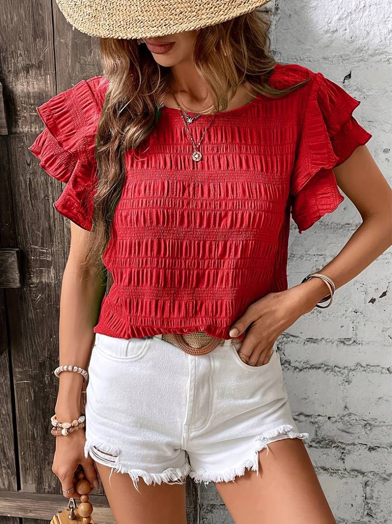 Catty - Élégante blouse à manches courtes avec volants superposés et bords texturés
