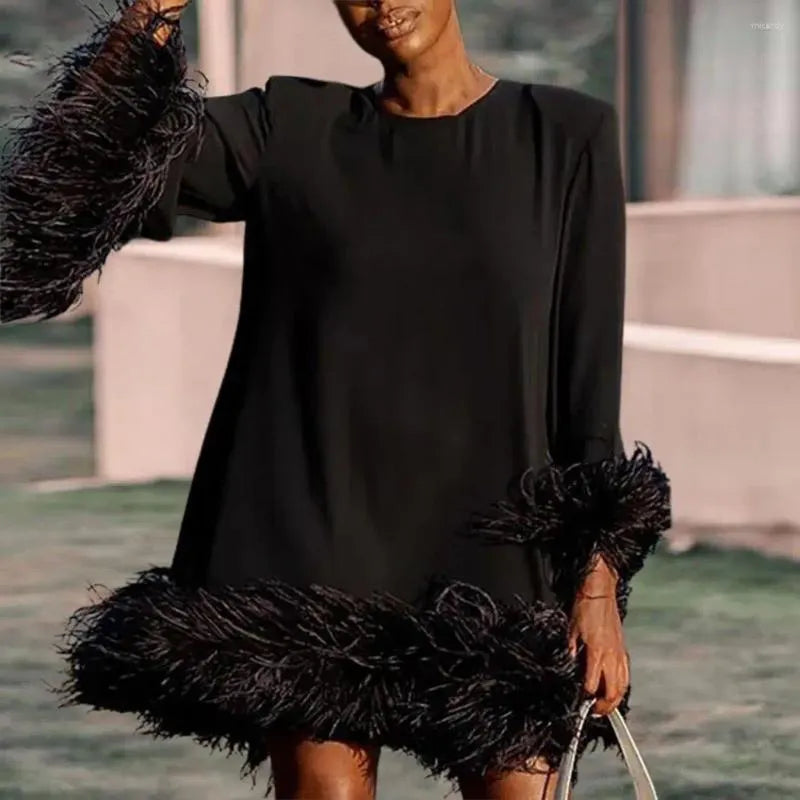 Phoebe - Robe à manches longues avec bordures en fausse fourrure