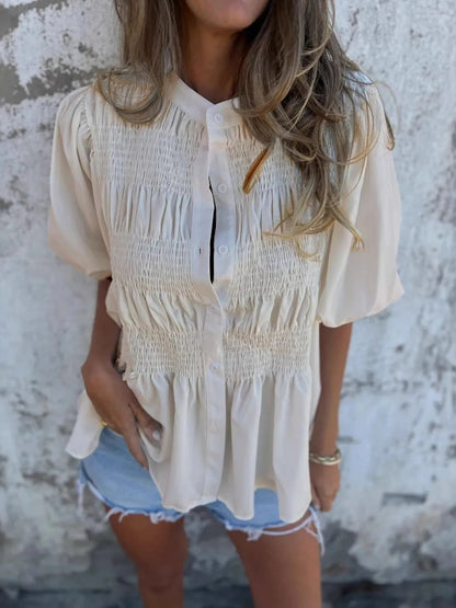 Lanie - Blouse à manches bouffantes avec boutons et ourlet volanté