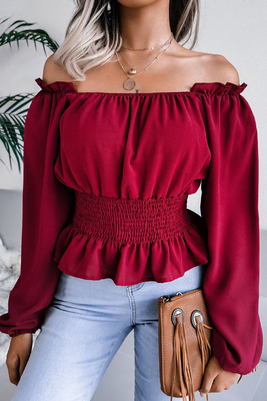 Landra - Élégante blouse à manches longues et épaules dénudées avec ourlet à volants