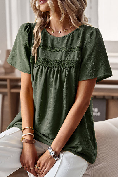 Lisa - Blouse élégante à manches courtes et pois suisses