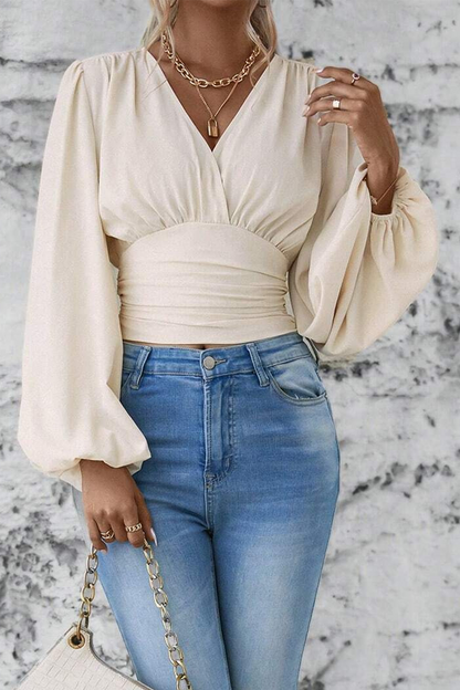 Emmie - Blouse stylée avec col en V et manches longues évasées