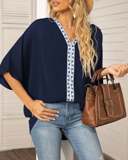 Lyla - Blouse ample à col en V et manches chauve-souris