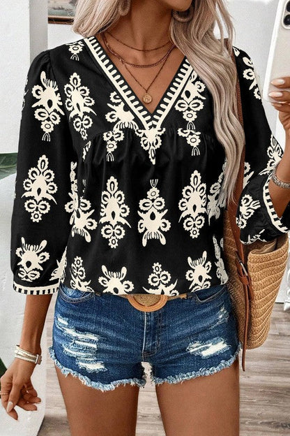 Joy - Blouse élégante à imprimé géométrique, manches mi-longues et col en V