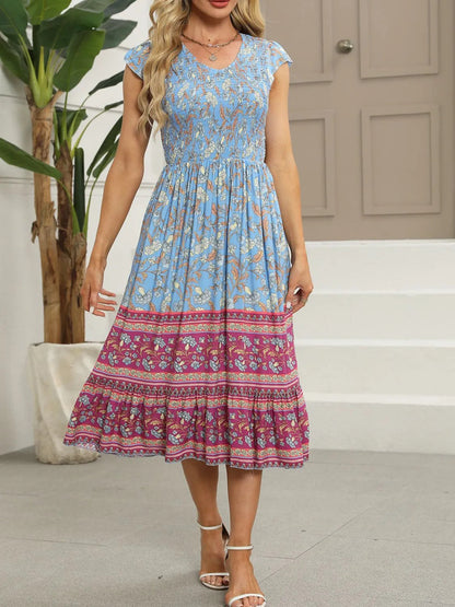 Cassandra - Robe fleurie élégante à manches courtes
