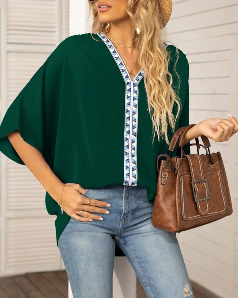 Lyla - Blouse ample à col en V et manches chauve-souris
