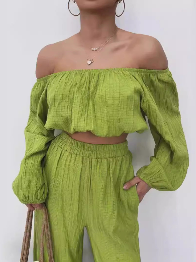 Elsa - Ensemble élégant avec crop top à épaules dénudées et pantalon large taille haute