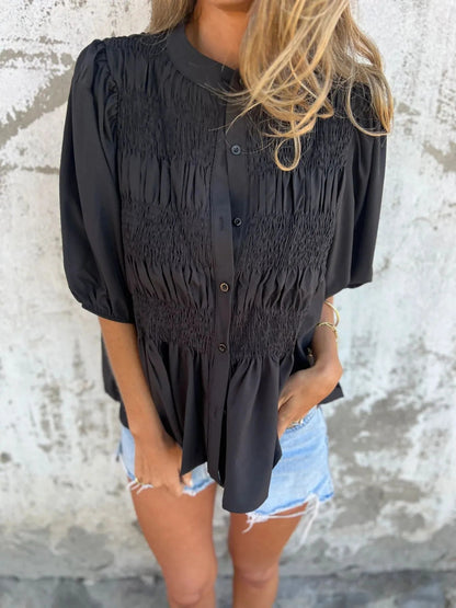 Lanie - Blouse à manches bouffantes avec boutons et ourlet volanté