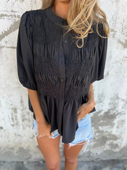 Lanie - Blouse à manches bouffantes avec boutons et ourlet volanté