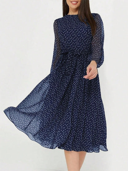 Zahra - Élégante robe midi à manches longues, col rond et pois