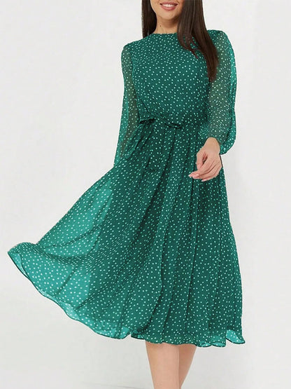 Zahra - Élégante robe midi à manches longues, col rond et pois