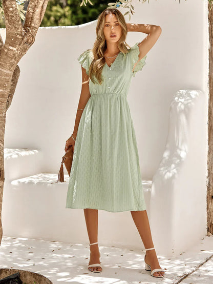 Luma - Robe en coton à col en V et manches flottantes