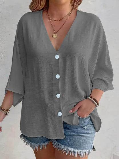 Amirah - Blouse décontractée à demi-manches, col en V et boutons