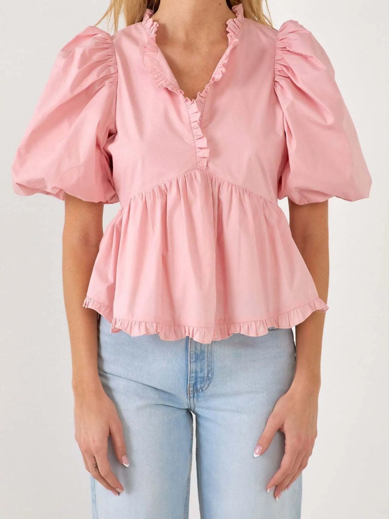 Kath - Élégante blouse peplum à manches bouffantes