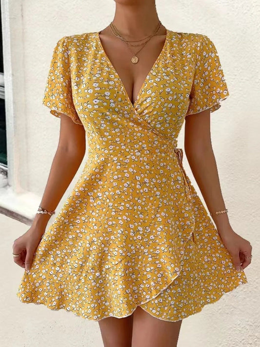 Rosanna - Élégante robe mini fleurie à manches courtes avec col en V profond